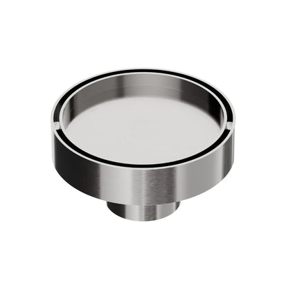 QM Drain Mist Couture Round Drain in Satin finish, available in 4”x 4” and 5 ¾”x 5 ¾” sizes. This elegant stainless-steel drain features a fine perforated circular grate, providing efficient water drainage while seamlessly integrating into modern luxury shower and bathroom installations.