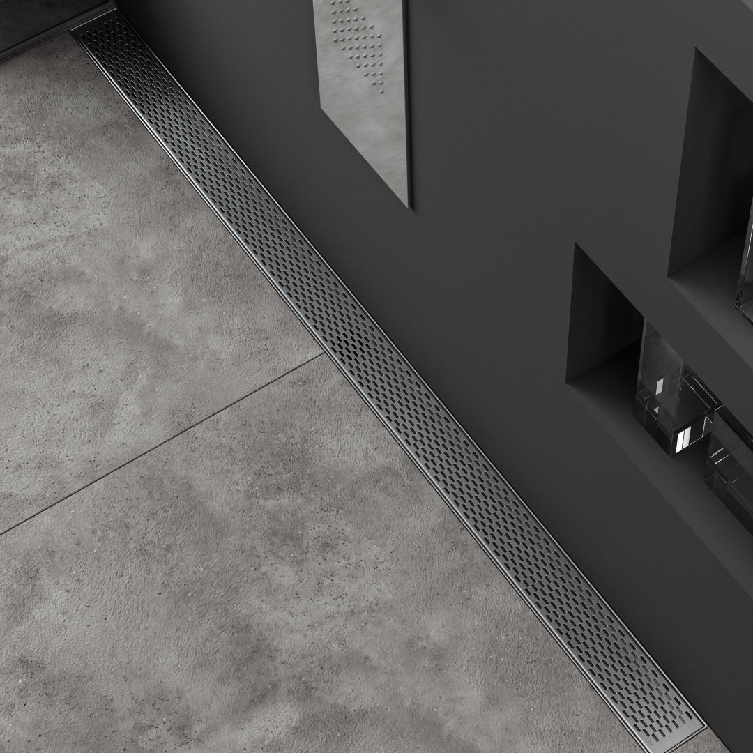 Modern bathroom web banner showcasing the QM Drain Delta Satin Linear Drain—sleek stainless-steel channel drain against a soft gray tile background, featuring minimalist slot grate, integrated waterproof flange, and text overlay highlighting satin finish and high-flow performance.