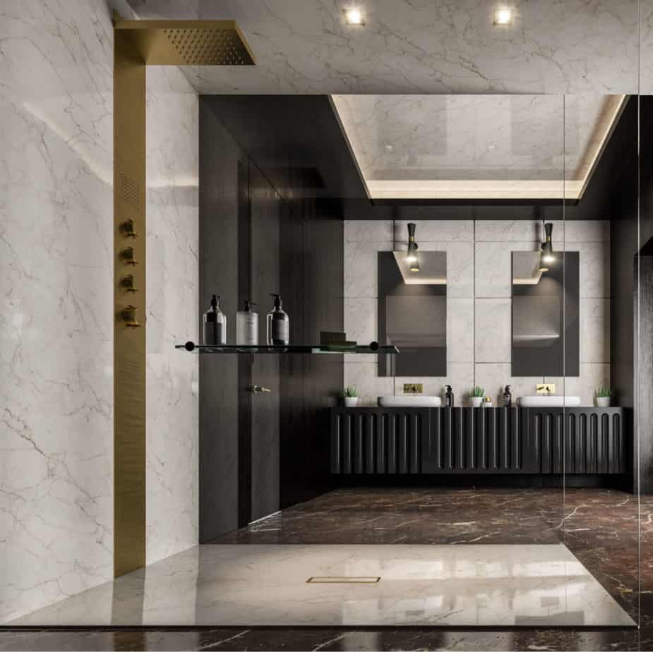 Modern shower floor showcasing the QM Drain Veil Linear Drain Lagos 2″ outlet—sleek stainless-steel channel with concealed veil-pattern grate, integrated waterproof flange beneath surrounding tiles, and high-capacity drainage for seamless, customizable luxury bathroom installations.