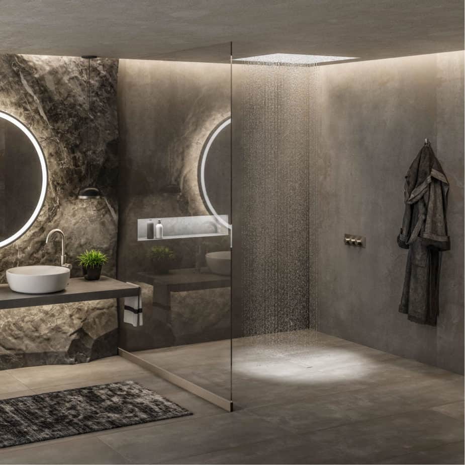 Modern shower floor showcasing the QM Drain Veil Linear Drain—sleek stainless-steel channel with concealed veil-pattern grate, integrated waterproof flange beneath surrounding tiles, and high-capacity drainage for a seamless minimalist luxury bathroom design.