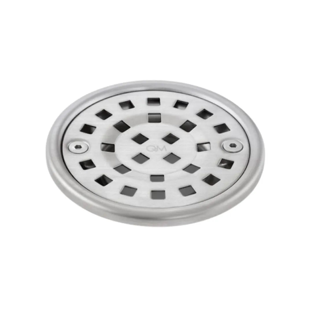 Close-up view of stainless steel round shower drain cover with perforated Ria grate pattern.