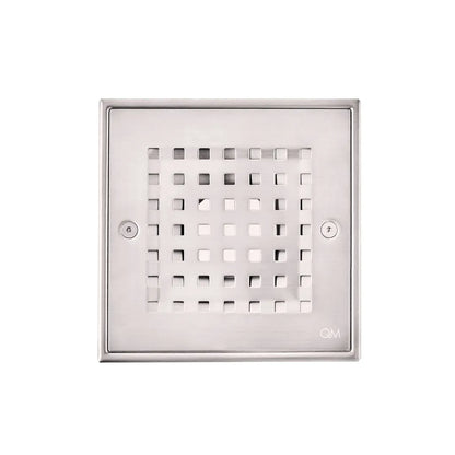 Close-up view of stainless steel square shower drain cover with perforated Ria grate design.