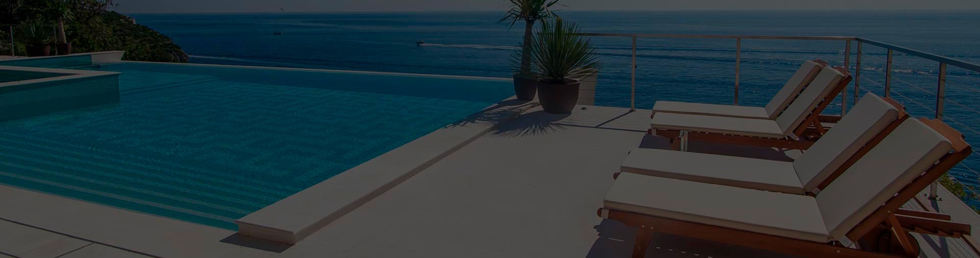 QM Drain Invisible Drain Banner showcasing a sleek, seamless drainage system installed on an outdoor deck adjacent to a pool. The banner highlights efficient water evacuation, minimalist design, and durable construction, perfect for luxury outdoor and poolside environments.