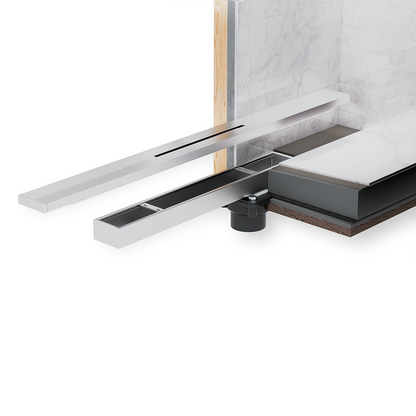 QM Drain Delmar Series Supreme Drain, featuring a sleek stainless-steel channel with a modern perforated grate design. This image showcases the drain’s efficient water drainage and seamless integration into luxury shower floors, providing a minimalist aesthetic for high-end bathroom installations.